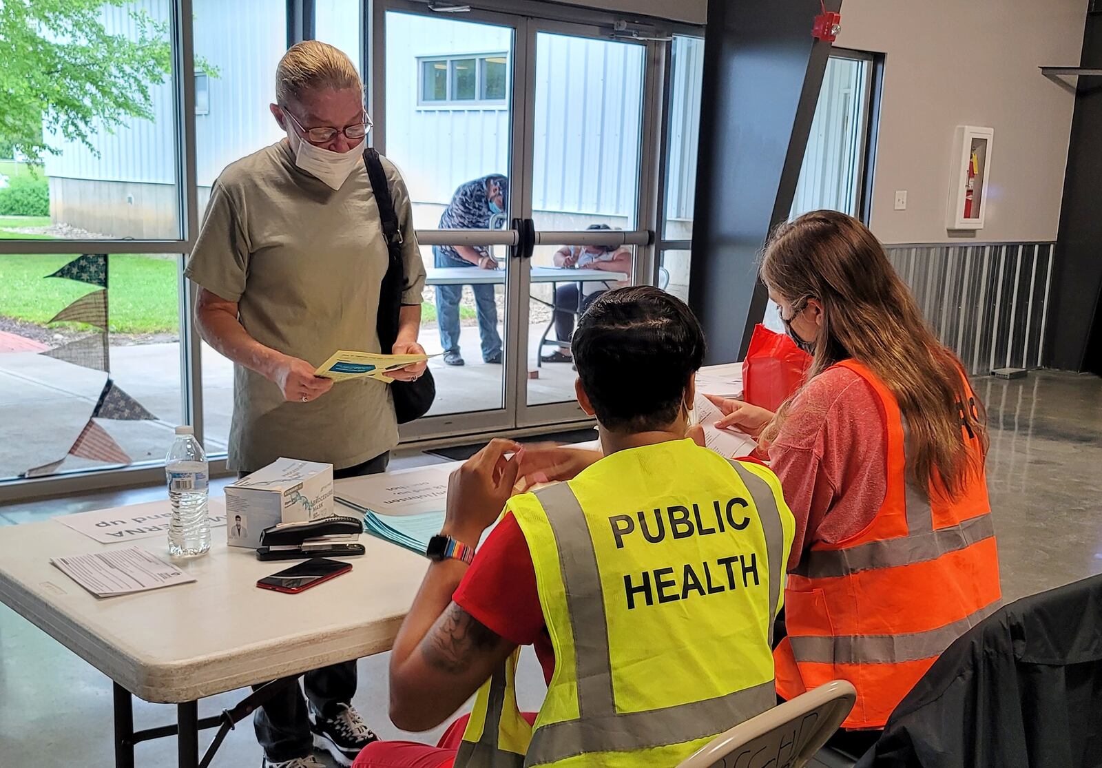 Emily King registers for her COVID-19 vaccine Wednesday, June 9, 2021 at the Butler County Fairgrounds. The Butler County Health Department with help from other agencies continues their COVID-19 vaccination clinics with Walk-in Wednesdays at the Butler County Fairgrounds in Hamilton. The clinic runs from 9 a.m. until noon on Wednesdays. NICK GRAHAM / STAFF