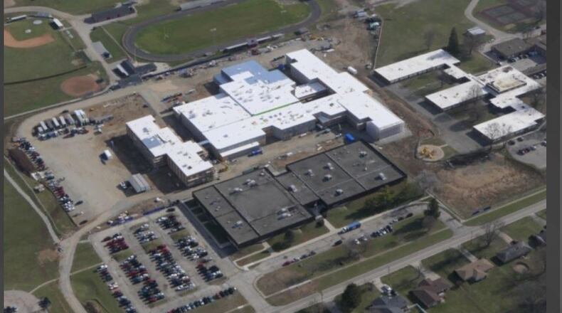 The new K-12 Carlisle school building, center, is being constructed behind the current Carlisle High School. The new building is nearing completion for an opening this fall. To the right is Alden Brown Elementary School. The current high school, elementary school and Chamberlain Middle School will be demolished this summer. CONTRIBUTED PHOTO