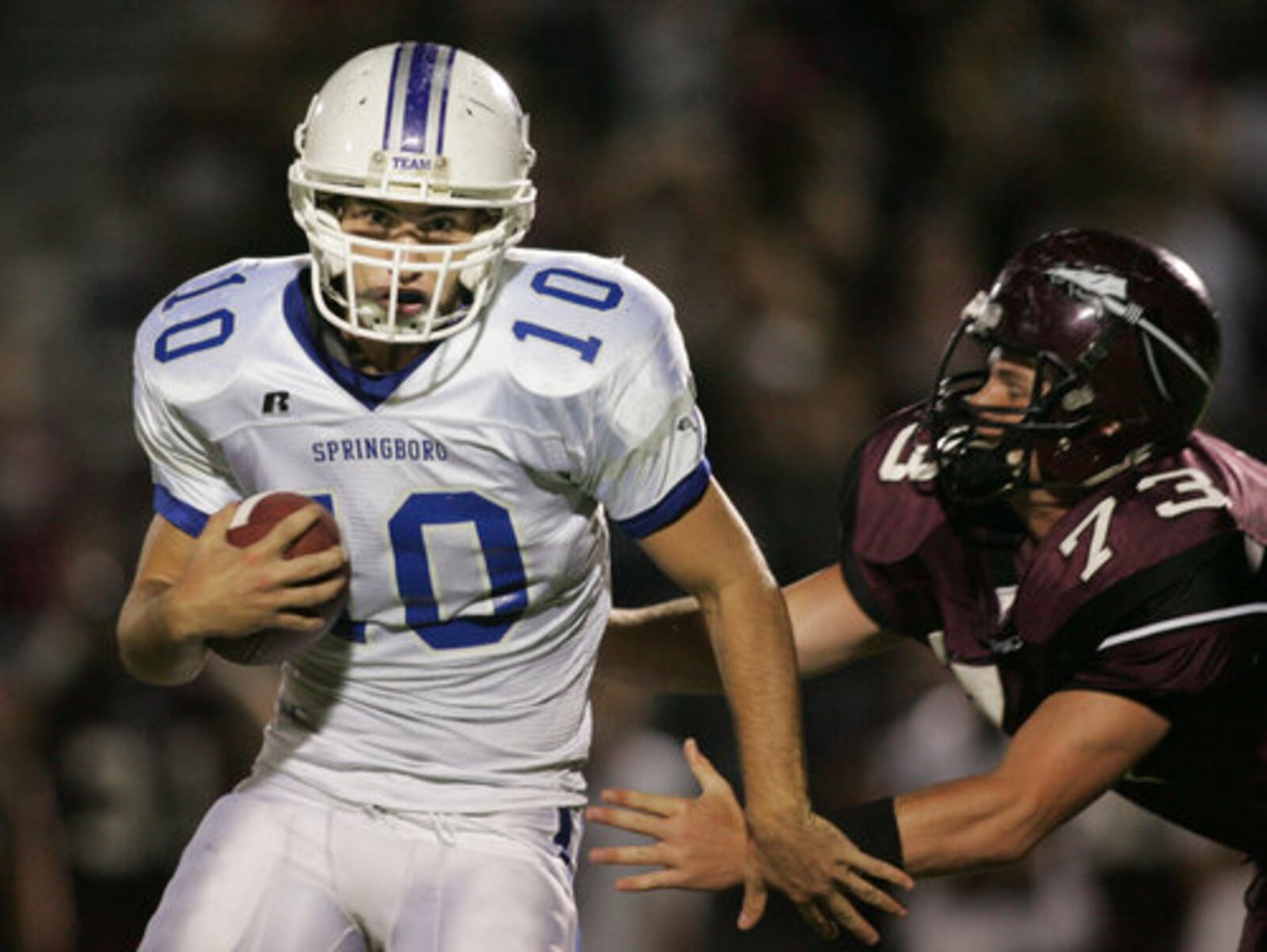 Josh Stuart (10), a Springboro linebacker, avoids the tackle of Nick Stotts, as Stuart returns an interception. Stuart returned the interception to Lebanon's 12 yard line with 10:56 left in the third quarter. The turnover set up a Springboro score with a touchdown pass two plays later. The game was hosted by Lebanon High School. After the succesful extra point, it gave Springboro a 7 to 0 lead.