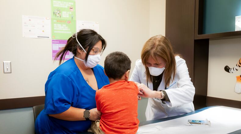 FILE — Nurses administer a a Measles, Mumps, Rubella, and Varicella virus vaccine at Seminole Hospital District in Seminole, Texas on Feb. 24, 2025. A raging measles outbreak in West Texas, which has so far killed one child, has not abated and may have taken root in New Mexico, state health officials reported on Friday. (Desiree Rios/The New York Times)