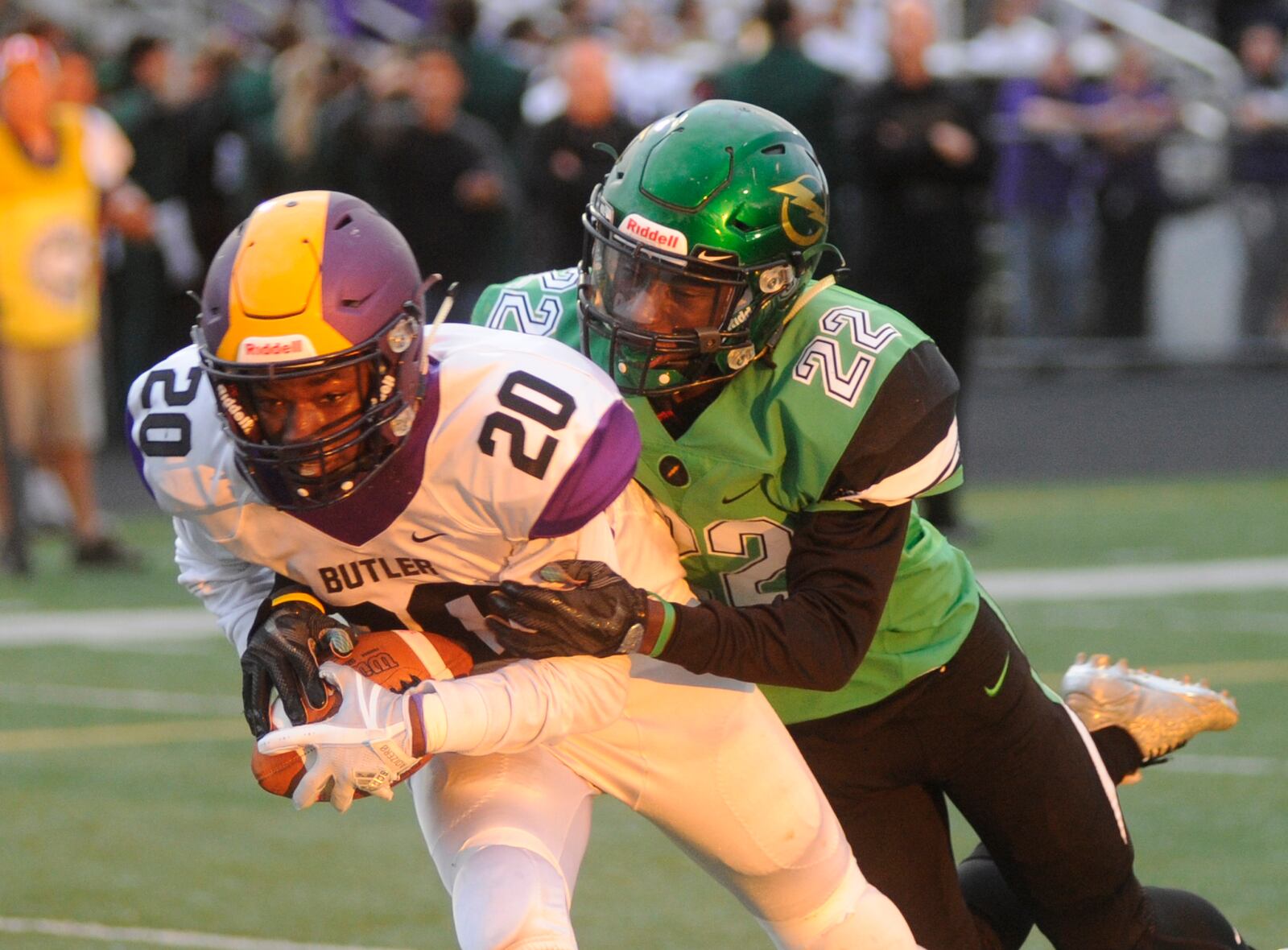 Butler’s Daiton Sharpe had beats Northmont defender A.J. Trammel for a first-quarter score. Northmont defeat visiting Butler 48-13. MARC PENDLETON / STAFF