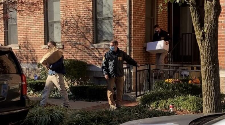 FBI agents remove boxes of materials from PUCO Chairman Sam Randazzo’s condo in Columbus Nov. 17, 2020. DANIEK KONIK/STATEHOUSE NEWS BUREAU VIA OCJ