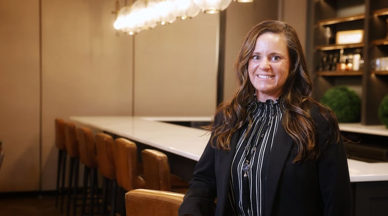 New director Angie Smith stands in the dining and ballroom area of the Middletown Event Center on Central Avenue in Middletown. NICK GRAHAM/STAFF