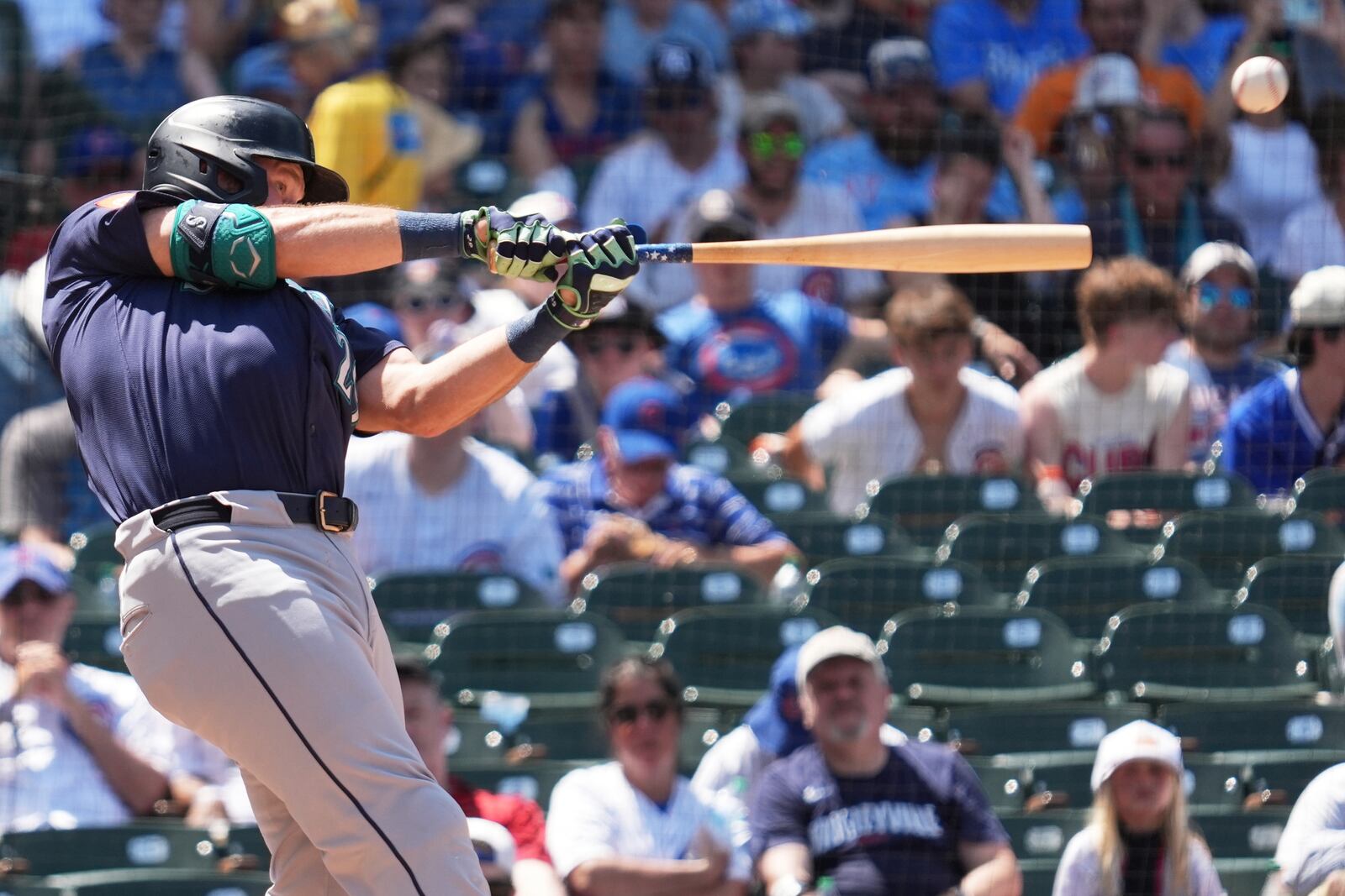 Seattle Mariners' Cal Raleigh hits a single during the fifth inning of a baseball game against the Chicago Cubs in Chicago, Sunday, June 22, 2025. (AP Photo/Nam Y. Huh)