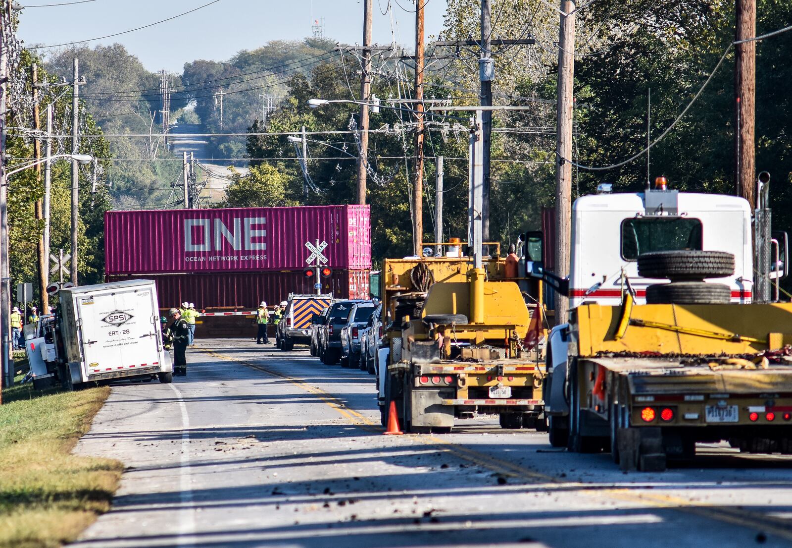 The collision between two trains early Tuesday morning, Oct. 8, 2019 in Hamilton, and near the southern Fairfield border caused three train cars to derail and left two crew members with minor injuries. The cars were back on track and the train was able to move around 10 a.m. “The rear three cars … contained one load of pulpwood and two loads of butane,” said Rachel McDonnell Bradshaw, spokeswoman for Norfolk Southern Corporation headquarters in Virginia. NICK GRAHAM/STAFF