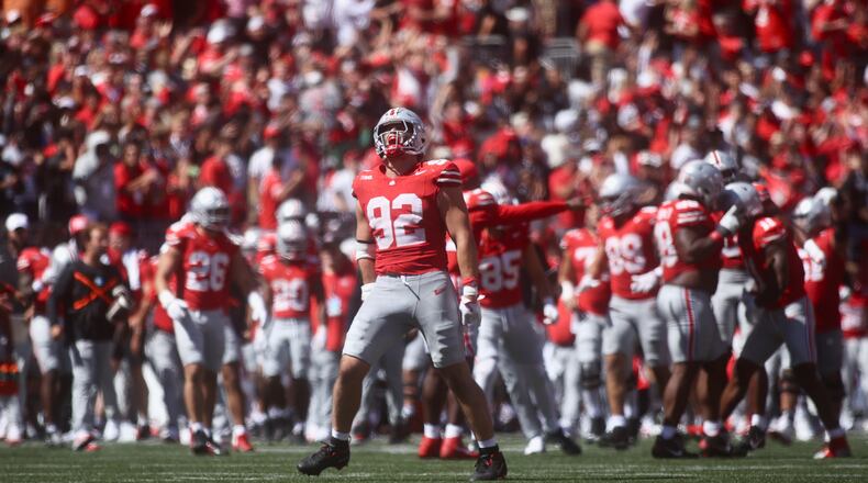 Ohio State's Caden Curry celebrates after a game-clinching defensive stop against Texas on Saturday, Aug. 30, 2025, at Ohio Stadium in Columbus. David Jablonski/Staff