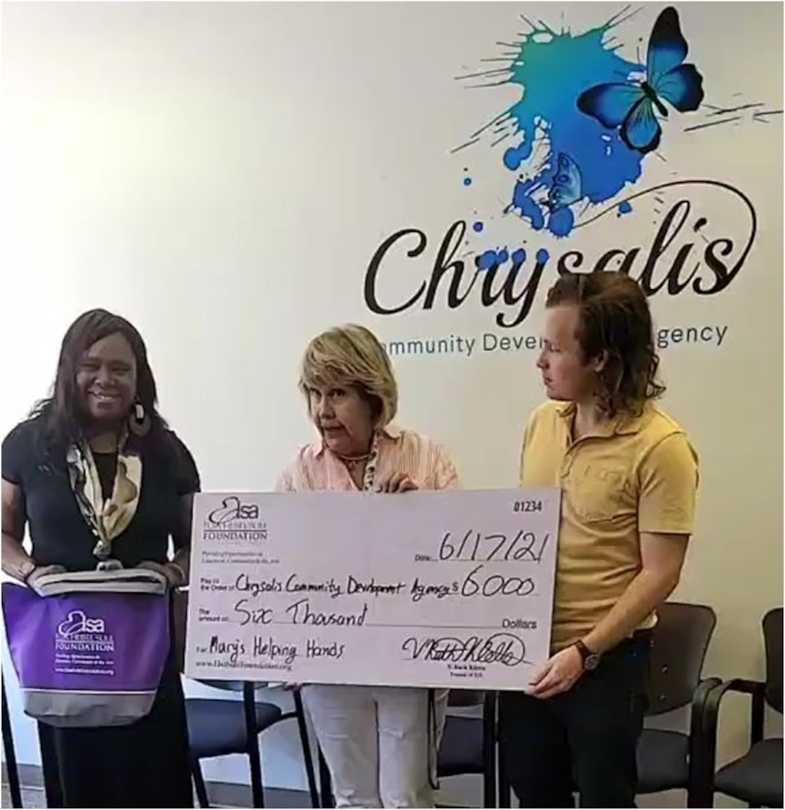The Rev. Vanessa McQueen (left) of the Chrysalis Community Development Agency at 110 Main St. in Hamilton, recently accepted $6,000 from the Elsa Heisel Sule Charitable Foundation of Fort Mitchell, Ky. CONTRIBUTED