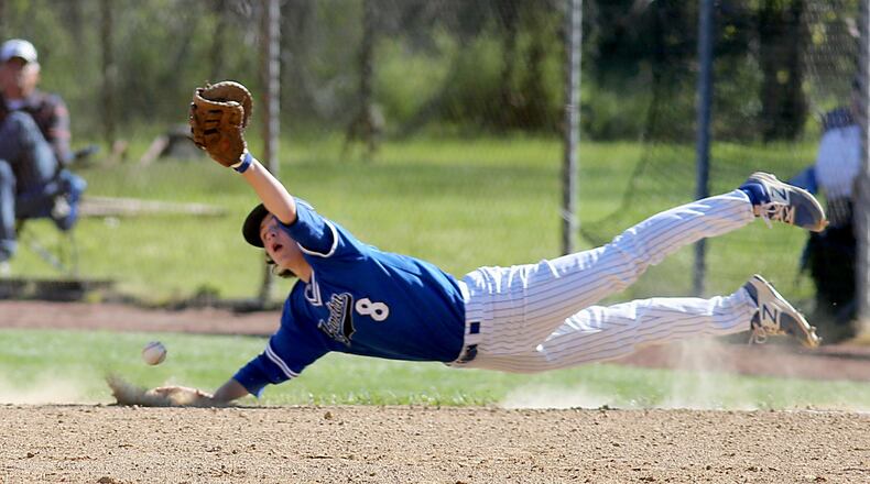 Hamilton first baseman Alex Mills dives for the ball during a game against Fairfield at Joe Nuxhall Field in Fairfield on May 7, 2017. CONTRIBUTED PHOTO BY E.L. HUBBARD