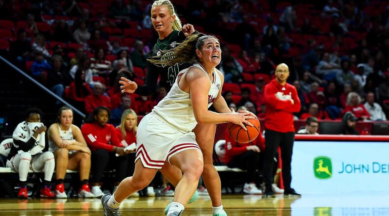 Miami's Tamar Singer drives to the hoop against Ohio earlier this season at Millett Hall. Kyle Hendrix/CONTRIBUTED