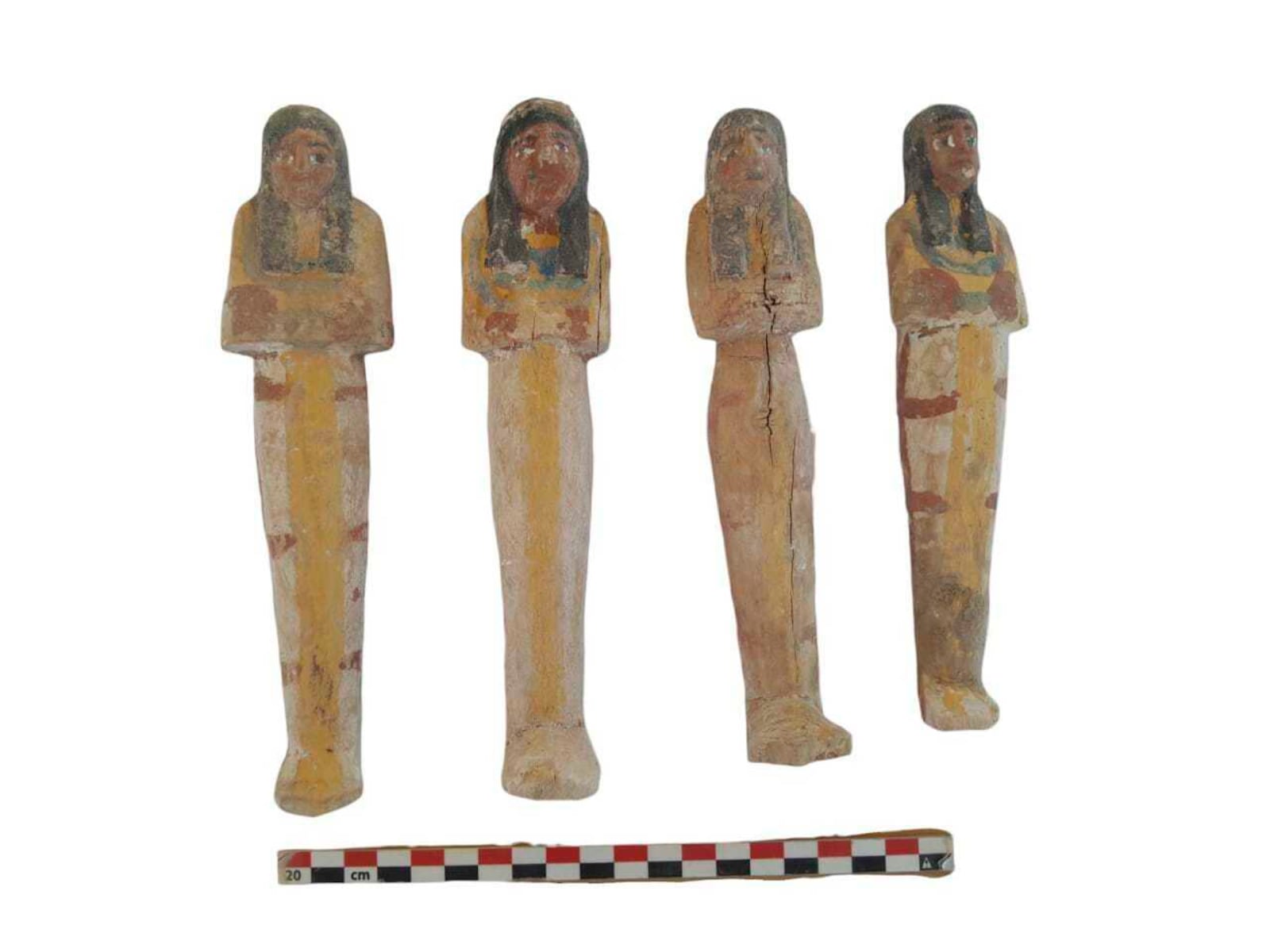 In this undated photo, artifacts are displayed that were found in the three new graves of senior statesmen found in the Dra' Abu al-Naga necropolis area in Luxor, Egypt. (Egypt Ministry of Tourism and Antiquities via AP)