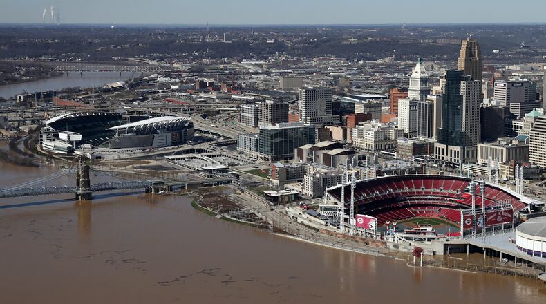 This Monday, Feb. 26, 2018, photo shows floodwater from the Ohio River flowing into downtown Cincinnati. The National Weather Service says the Ohio River crested Sunday and was still well above flood stage Monday. (Kareem Elgazzar/The Cincinnati Enquirer via AP)