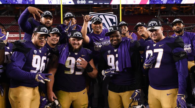 SANTA CLARA, CA - NOVEMBER 30: Washington Huskies players celebrate winning the Pac-12 Championship Game on November 30, 2018 at Levi's Stadium in Santa Clara, California. (Photo by Cody Glenn/Icon Sportswire via Getty Images)