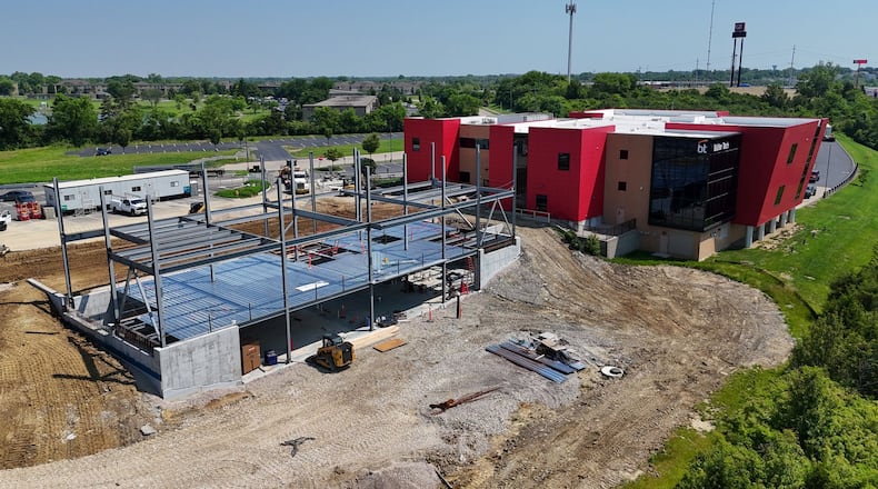Ongoing construction work to add to Butler Tech’s fast-growing Bioscience Center is now seeing a three-story, 25,000-square-foot addition to the medical career training school at the Interstate-75 and Cincinnati-Dayton Road interchange in West Chester Twp. NICK GRAHAM/STAFF