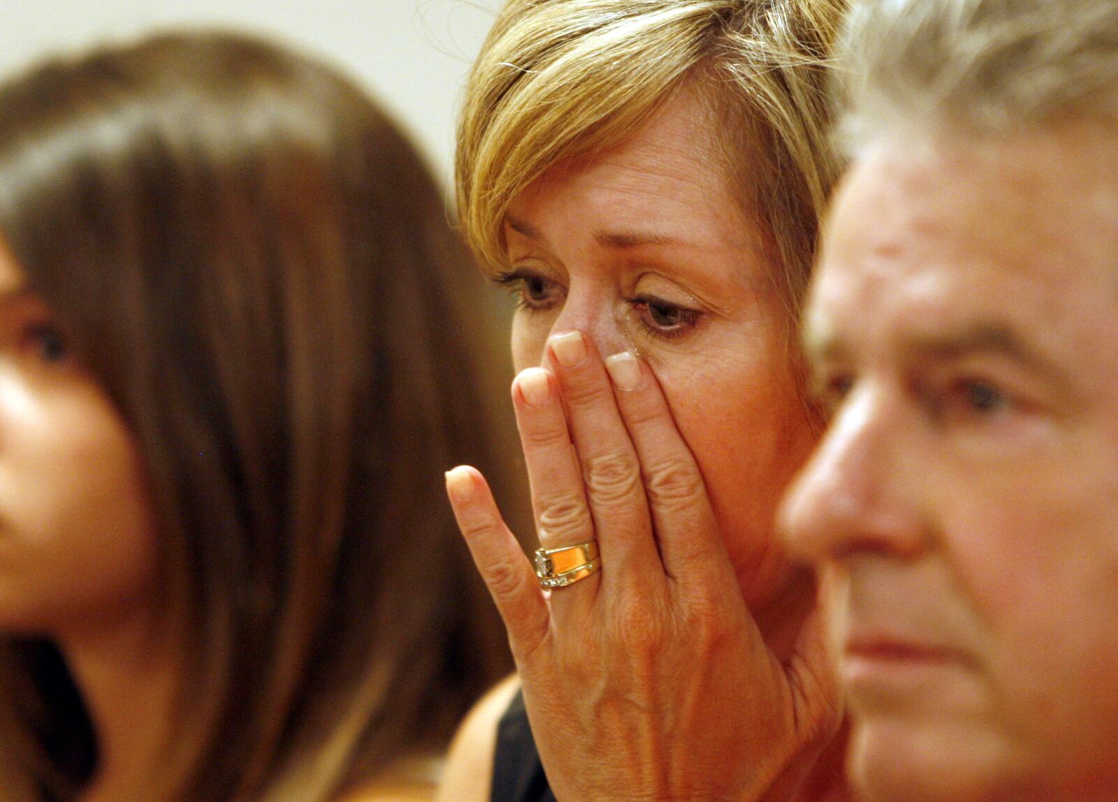 Connie Speidel, mother of Beth Speidel, a Miami University student who was struck and killed by a train, reacts as the CSX Corporation donates $25,000 to start a scholarship in her daughter’s memory to Miami University. 