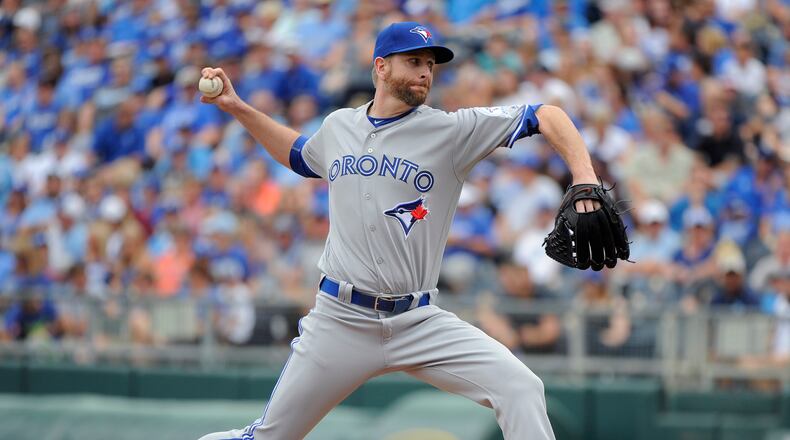 KANSAS CITY, MO - AUGUST 7: Scott Feldman #46 of the Toronto Blue Jays throws in the seventh inning against the Kansas City Royals at Kauffman Stadium on August 7, 2016 in Kansas City, Missouri. (Photo by Ed Zurga/Getty Images)