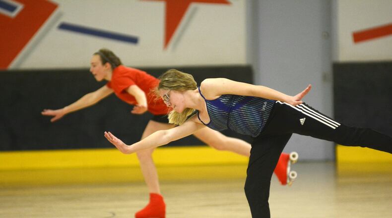 Amy Hasselbrock, a 16-year-old junior at Fairfield High School, practices artistic skating June 14 at Skatetown USA in West Chester Twp. She’s a member of the Skatetown Artistic Team and will compete this summer at the USA Roller Sports’ regional championships in Michigan. MICHAEL D. PTIMAN/STAFF