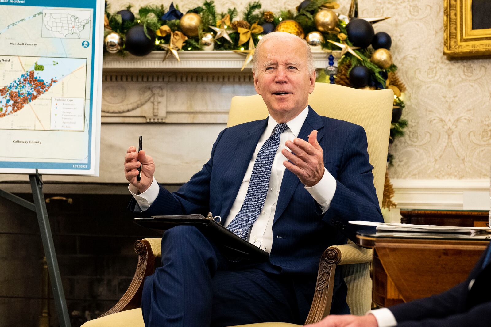 President Joe Biden speaks in the Oval Office of the White House in Washington on Monday, Dec. 13, 2021, about the Federal response to the tornadoes that impacted multiple states including Kentucky. After grimly fluctuating death tolls since Friday’s devastating swarm of tornadoes, Gov. Andy Beshear of Kentucky said on Monday that there were 64 confirmed deaths in the state, though he expected that number to rise as crews continued to search through the ruins. (Doug Mills/The New York Times)