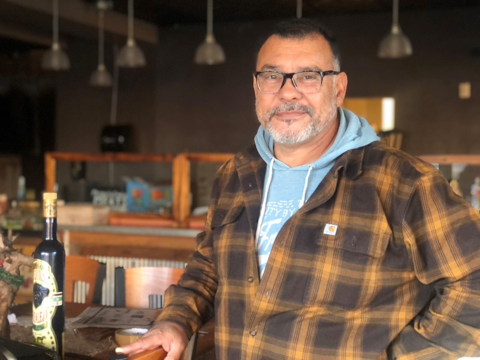 James Nuñez, owner of Texas Beef & Cattle, inside his store in the Wright Dunbar business district. The business is in the process of moving to a building on Stanley Avenue. CORNELIUS FROLIK / STAFF