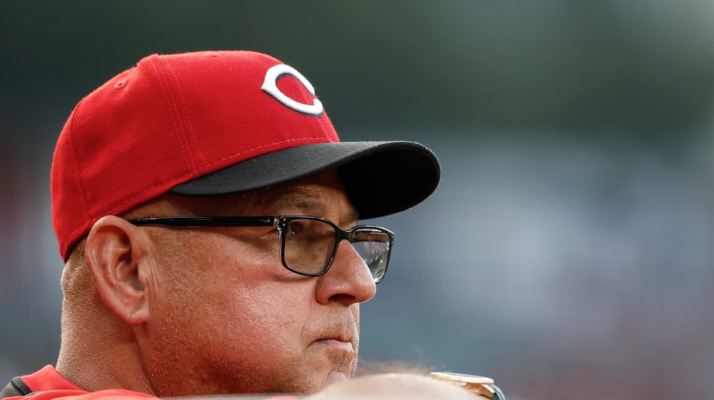 Cincinnati Reds manager Terry Francona looks on from the dugout during the second inning of a baseball game against the Washington Nationals in Washington, Tuesday, July 22, 2025. (AP Photo/Terrance Williams)