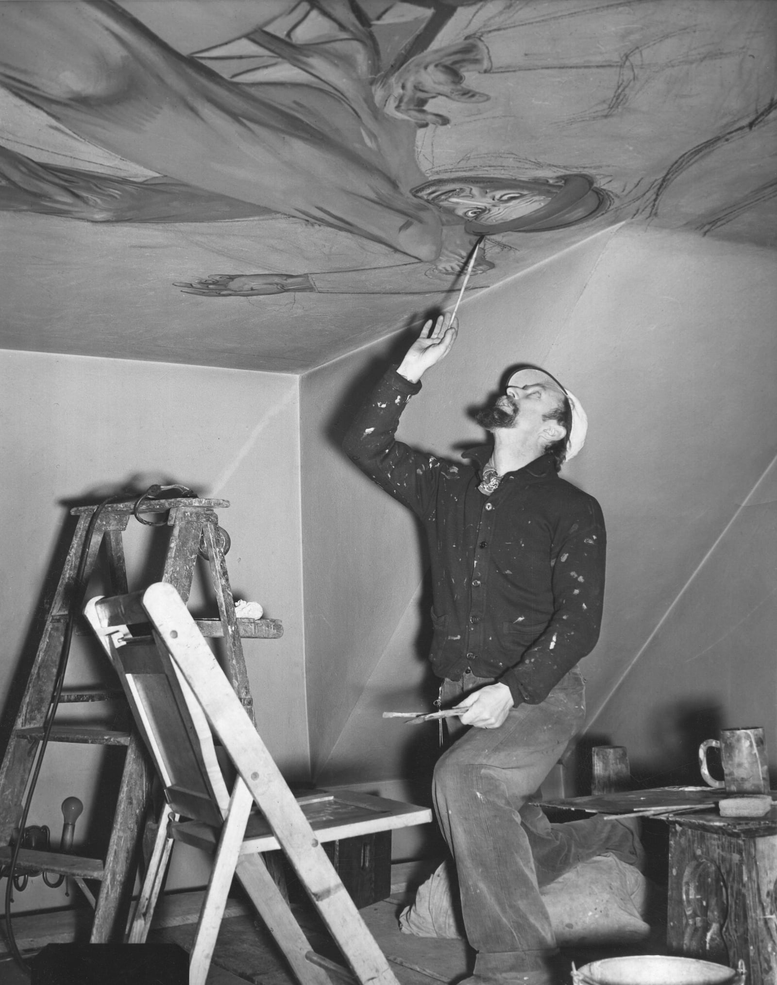 Artist Maxo Vanka works on a mural inside St. Nicholas Croatian Catholic Church in Millvale, Pa., on Nov. 7, 1941. (AP Photo/William C. Allen, File)