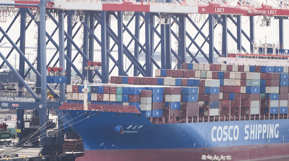 A ship is docked at the Port of Long Beach Friday, Feb. 20, 2026, in Long Beach, Calif. (AP Photo/Damian Dovarganes)