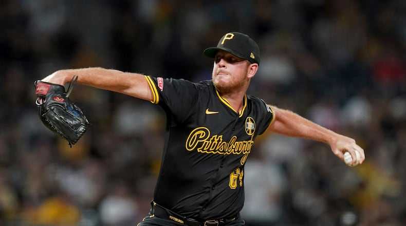Pittsburgh Pirates relief pitcher Caleb Ferguson delivers during the seventh inning of a baseball game against the Arizona Diamondbacks, Saturday, July 26, 2025, in Pittsburgh. (AP Photo/Matt Freed)