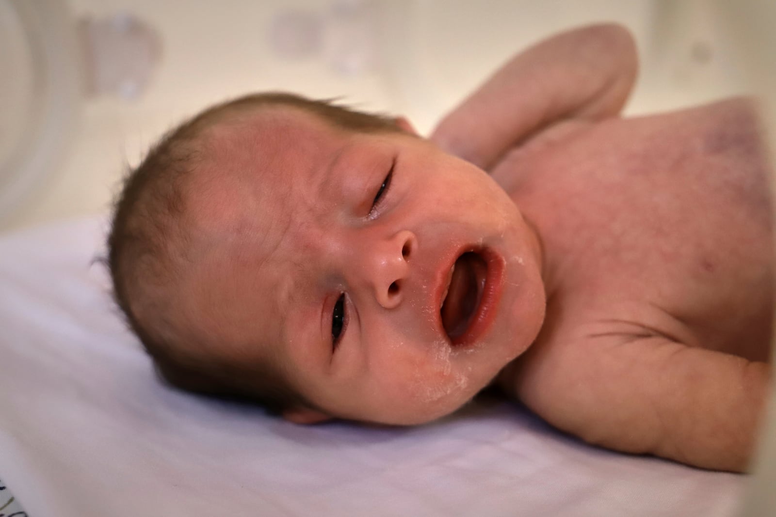 A prematurely born baby lies in an incubator at the neonatal intensive care unit of Nasser Hospital in Khan Younis, southern Gaza Strip, Thursday, June 19, 2025. (AP Photo/Mariam Dagga)