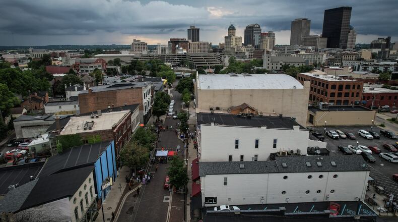 This is a drone photograph looking northwest at Fifth Street, lower left, to downtown Dayton. The third anniversary of the Oregon District mass shooting was held Thursday, Aug. 4, 2022. JIM NOELKER/STAFF