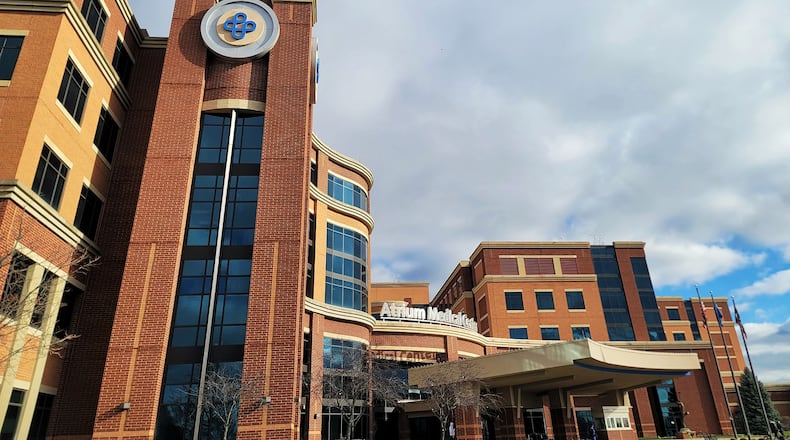 Premier Health, which operates Atrium Medical Center in Middletown, last year started a joint venture with the Christ Hospital Health Network in Cincinnati as a way to provide better cardiac care and streamline expenses. NICK GRAHAM/STAFF