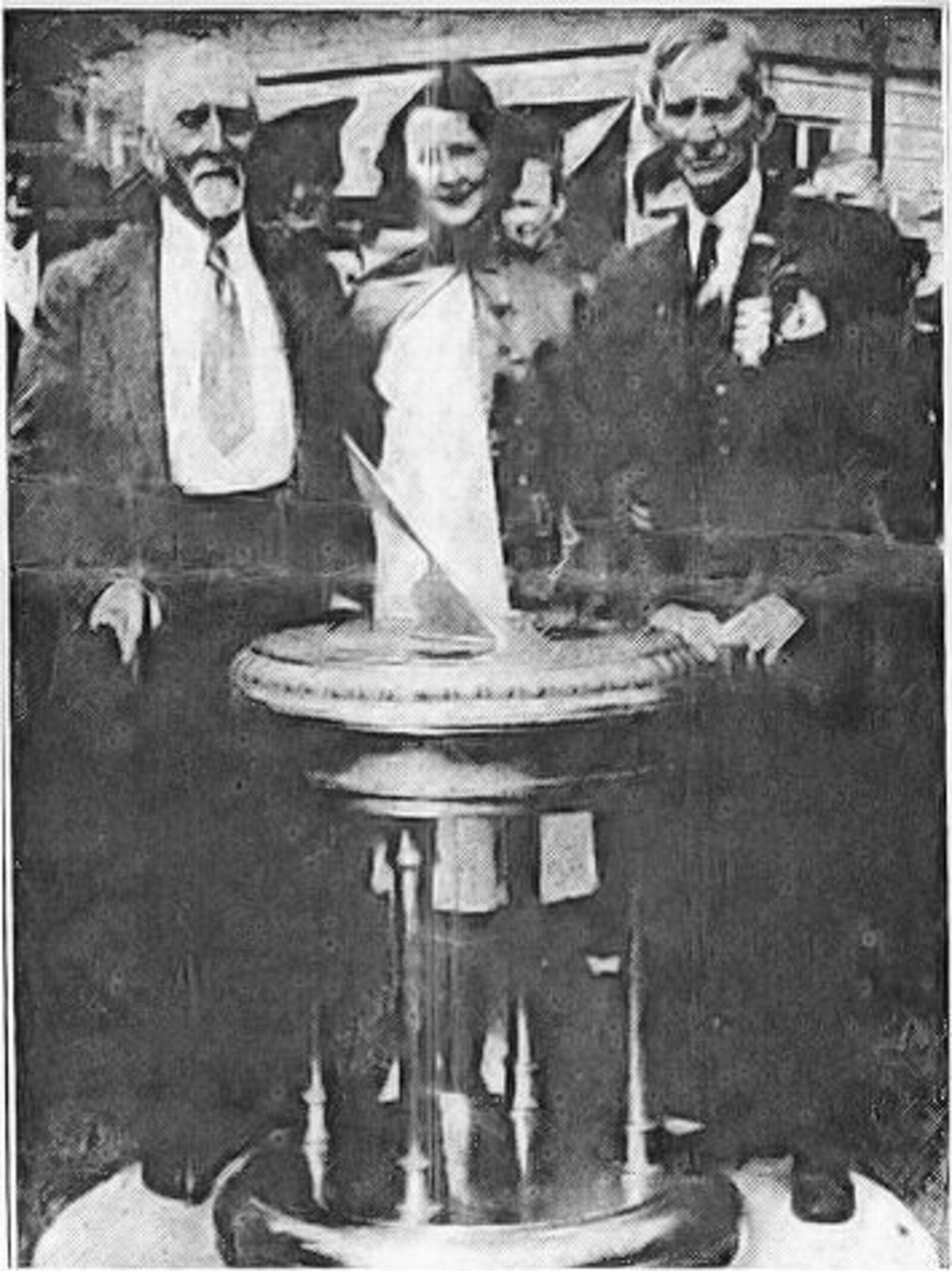 This Journal-News images is dated May 26, 194. Left to right: Jacob Inman (age 99), Helen Baxter (president of the Daughters of Union Veterans of the Civil War), and Clinton Orr (age 97).  Inman and Orr were Butler County's last two remaining Civil War veterans. The photo was taken during the dedication of a bronze sundial memorial honoring the memory of the Grand Army of the Republic. This sundial is still on the monument's grounds. CONTRIBUTED