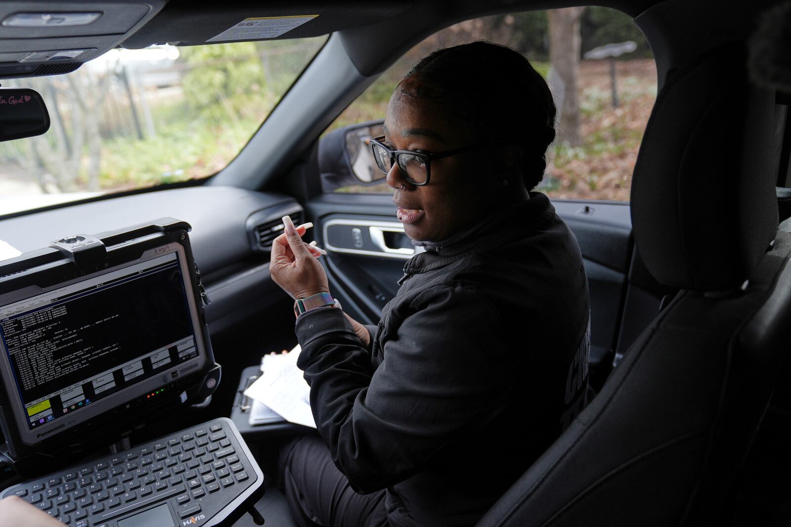 Crisis Intervention Response Team (CIRT) member Therapist Krystian Gardner speaks with her partner Philadelphia Police Officer Vanity Cordero in Philadelphia, Friday, March 14, 2025. (AP Photo/Matt Rourke)