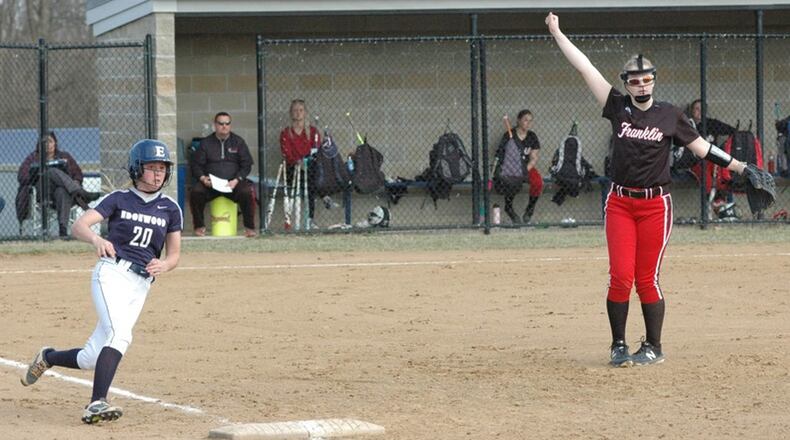 Edgewood’s Sarah Schiavone (20) rounds first base as Franklin’s Brooke Stover watches the ball March 28 during a nonconference softball game in St. Clair Township. Host Edgewood won 13-3 in six innings. RICK CASSANO/STAFF
