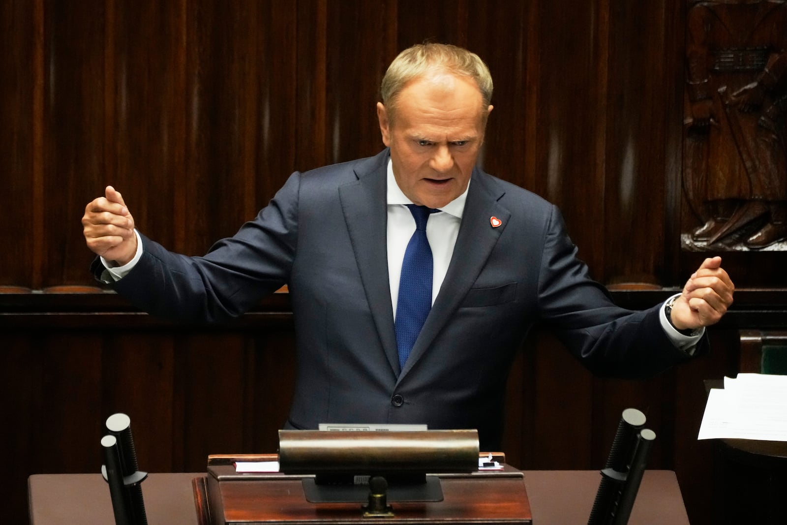 Poland's Prime Minister Donald Tusk addresses the Polish parliament on Wednesday, June 11, 2025, in Warsaw, Poland. (AP Photo/Czarek Sokolowski)