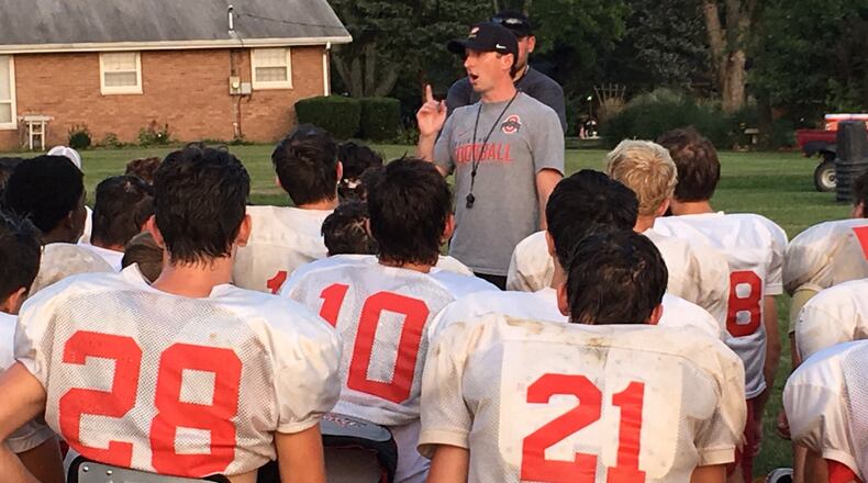 New Fenwick head coach Dan Haverkamp makes a point to his team after a recent practice at the school. RICK CASSANO/STAFF