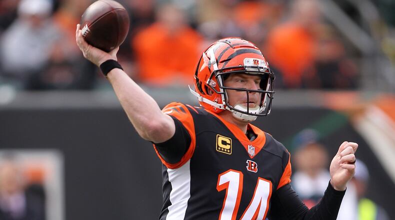 CINCINNATI, OH - NOVEMBER 25: Andy Dalton #14 of the Cincinnati Bengals throws a pass during the first quarter of the game against the Cleveland Browns at Paul Brown Stadium on November 25, 2018 in Cincinnati, Ohio. (Photo by John Grieshop/Getty Images)