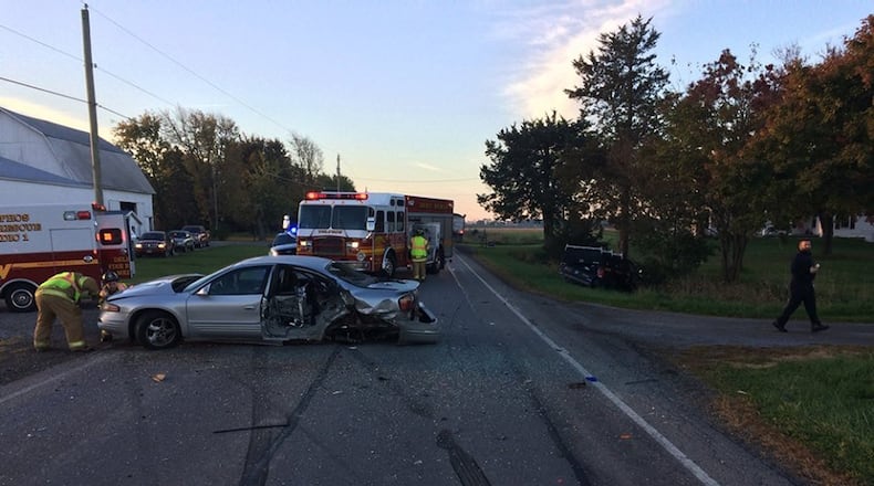 A distracted driver went left of center and struck two vehicles last month. The driver told an OSP trooper she looked down to change the radio before the crash.