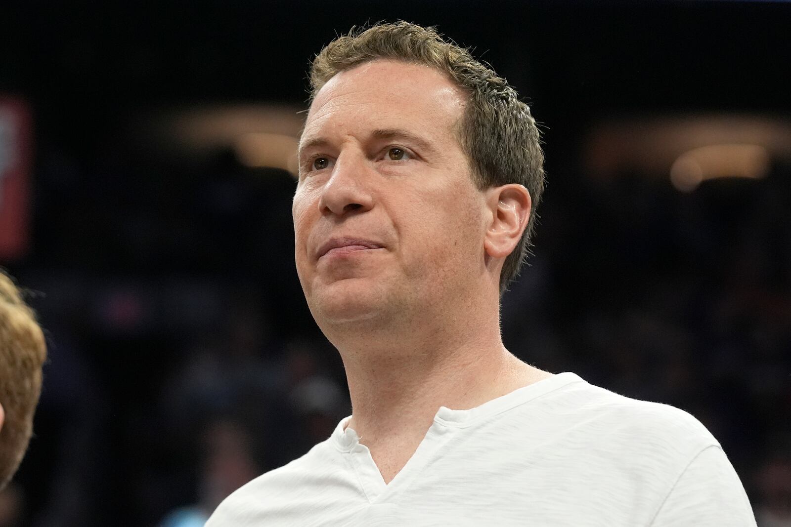 FILE - Phoenix Suns owner Mat Ishbia watches players warm up prior to Game 4 of an NBA basketball first-round playoff series against the Minnesota Timberwolves, April 28, 2024, in Phoenix. (AP Photo/Ross D. Franklin, file)