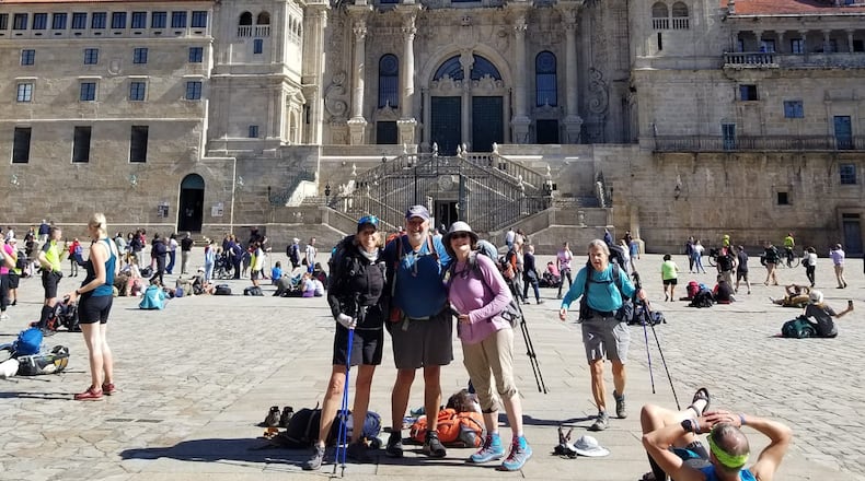 The four friends finish their journey at the Cathedral of Santiago de Compostela. From left: Gail Krentz, Norm Essman and Persis Ellwood. Margie Mahle approaching from rear right. CONTRIBUTED