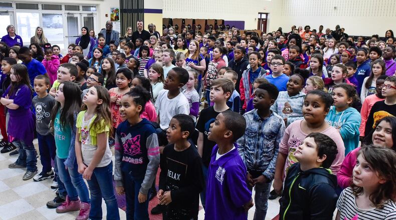 Students sing “Lift Every Voice and Sing” during the 12th Annual Rosa Parks Day Program Friday, Feb. 23 at Rosa Parks Elementary School in Middletown. NICK GRAHAM/STAFF