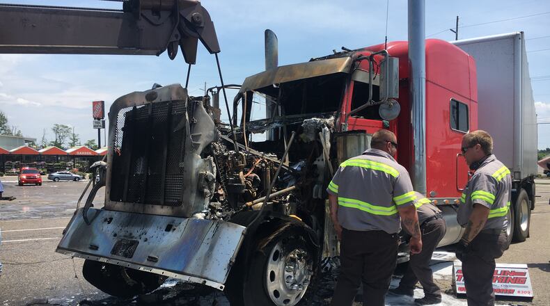A large semi truck fire next to Home Depot in Fairfield Twp. closed part of a road on Thursday, June 27, 2019. MICHAEL D. PITMAN / STAFF