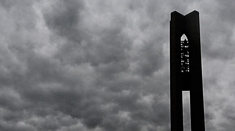 Deeds Carillon surrounded by rain clouds. MARSHALL GORBY / STAFF