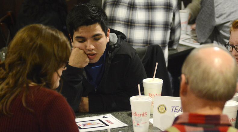 Eleven teams participated in the monthly Fairfield Rotary Trivia Night held every third Wednesday at Richard’s Pizza on Nilles Road in Fairfield. Pictured are some of the participants answering trivia questions on Wednesday.