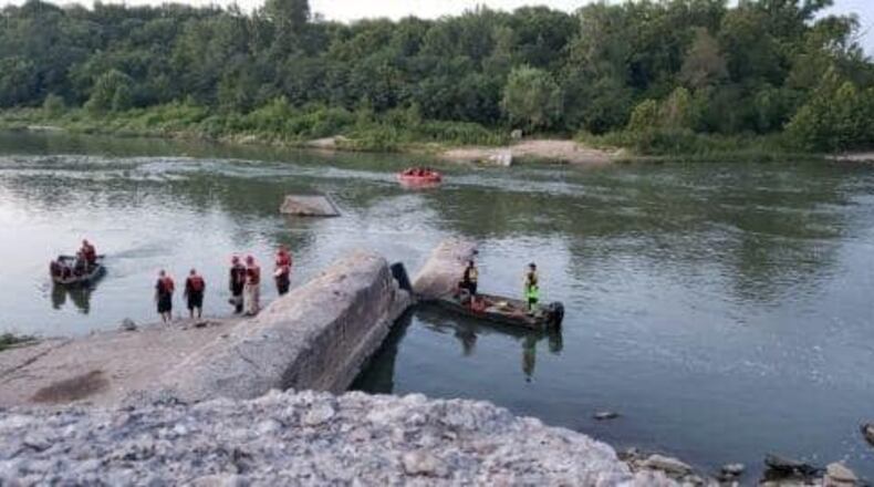 The Butler County Sheriff's Office marine unit along with units from Middetown, Monroe and Franklin work to find a man who did not resurface while swimming Tuesday night in the Great Miami River. BUTLER COUNTY SHERIFF'S OFFICE