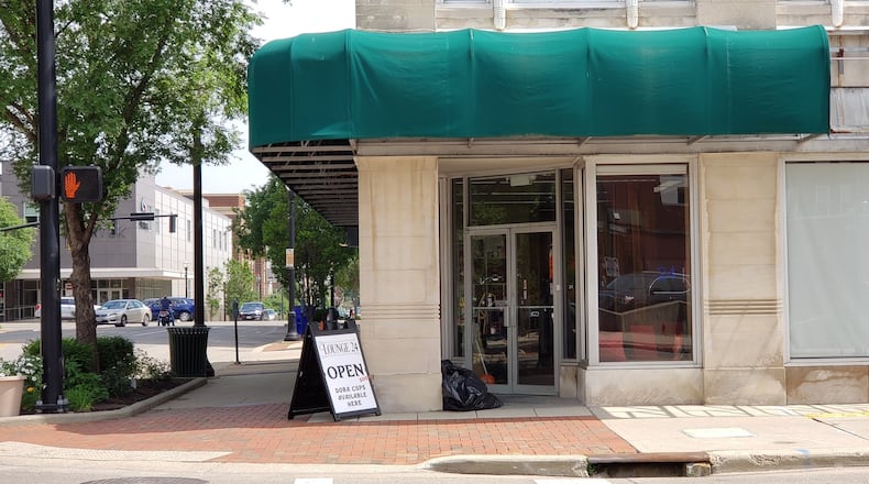 Lounge 24, a new business at 24 S. Second St. in Hamilton, offers local craft beer, Ohio wines and cocktails, as well as a fruit and cheese tray. ERIC SCHWARTZBERG / STAFF