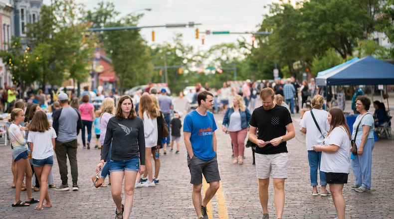 People are seen on High Street in oxford during a 2023 Red Brick Friday event. CONTRIBUTED/CITY OF OXFORD