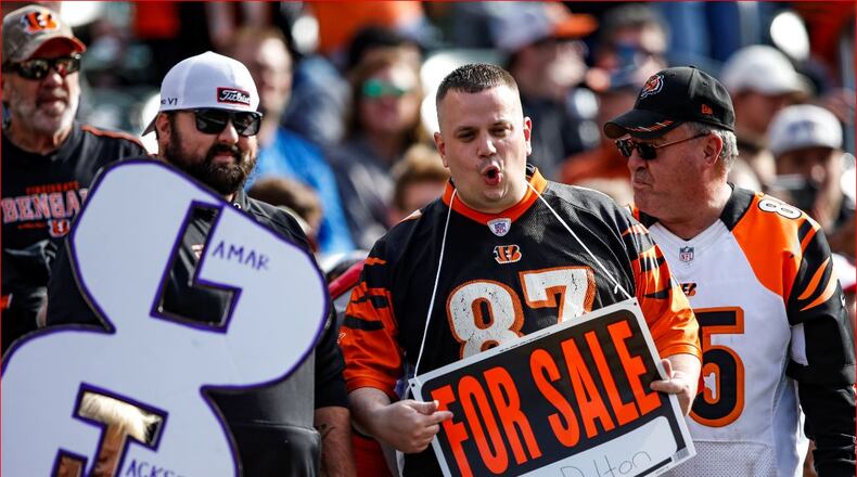 Fans jeer in the stands during the first half of the NFL football game between the Cincinnati Bengals and the Baltimore Ravens, Nov. 10, 2019, in Cincinnati. (AP Photo/Gary Landers)
