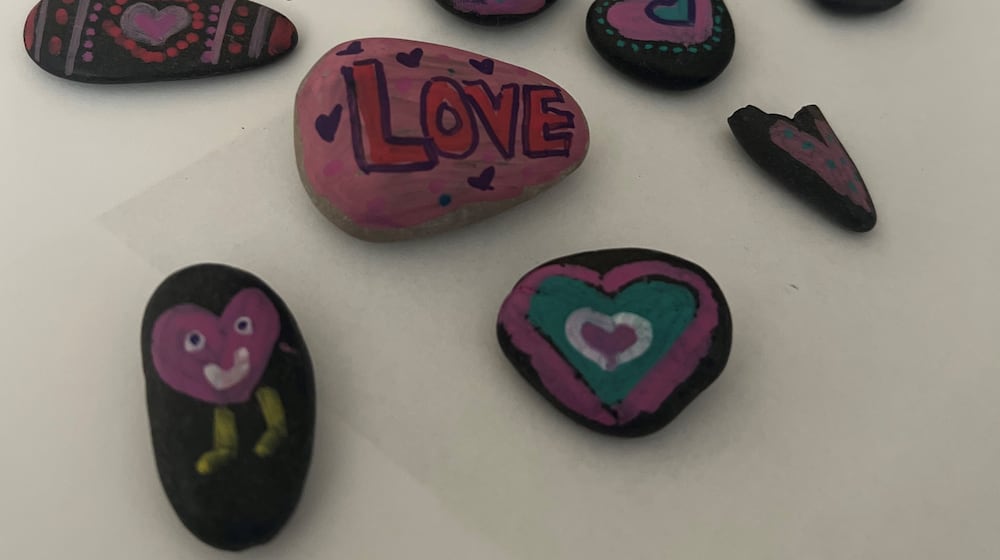 Each week, Pamela and her daughter paint colorful rocks with uplifting messages and scatter them throughout the community, hoping to spark smiles, start conversations, and remind others that kindness is still very much alive. CONTRIBUTED/CHANDLER