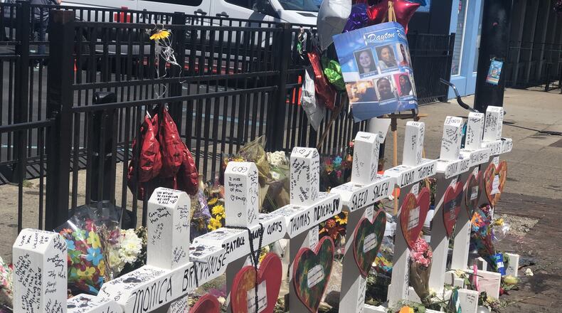 The memorial to the nine people killed in the Aug. 4 shooting in the Oregon District. CORNELIUS FROLIK / STAFF