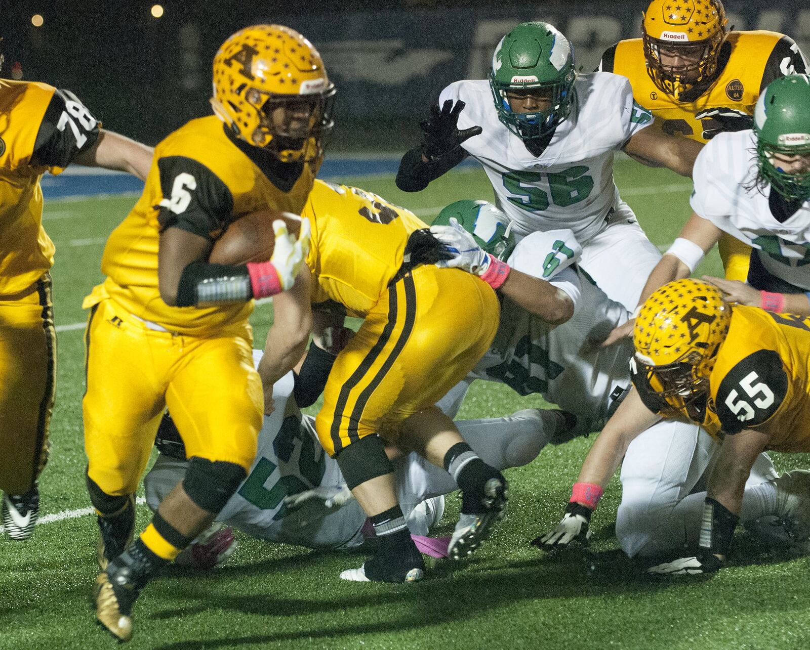 Alter’s Lamar Landers (6) runs the ball during a 35-3 victory over Chaminade Julienne on Oct. 26 at Fairmont. CONTRIBUTED PHOTO BY JEFF GILBERT