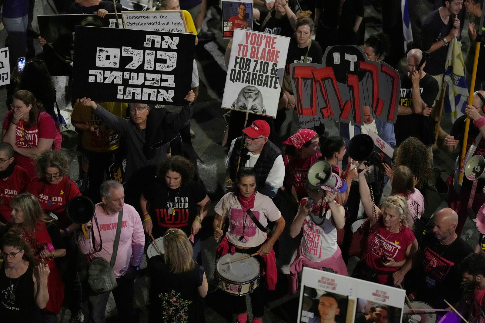 People take part in a protest demanding the immediate release of hostages held by Hamas in the Gaza Strip, in Tel Aviv, Israel, on Saturday, April 19, 2025. (AP Photo/Ariel Schalit)